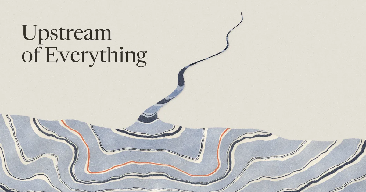 The title Upstream of Everything in dark serif type on cream paper. A thin dark river winds down from the top of the card into a band of blue marbled paper, striped with cream and navy lines and one coral line.